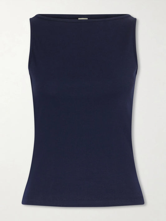 Image of a model wearing Tops. Product name - Timmi Ribbed Organic Cotton Tank in Navy colour by brand - FLORE FLORE