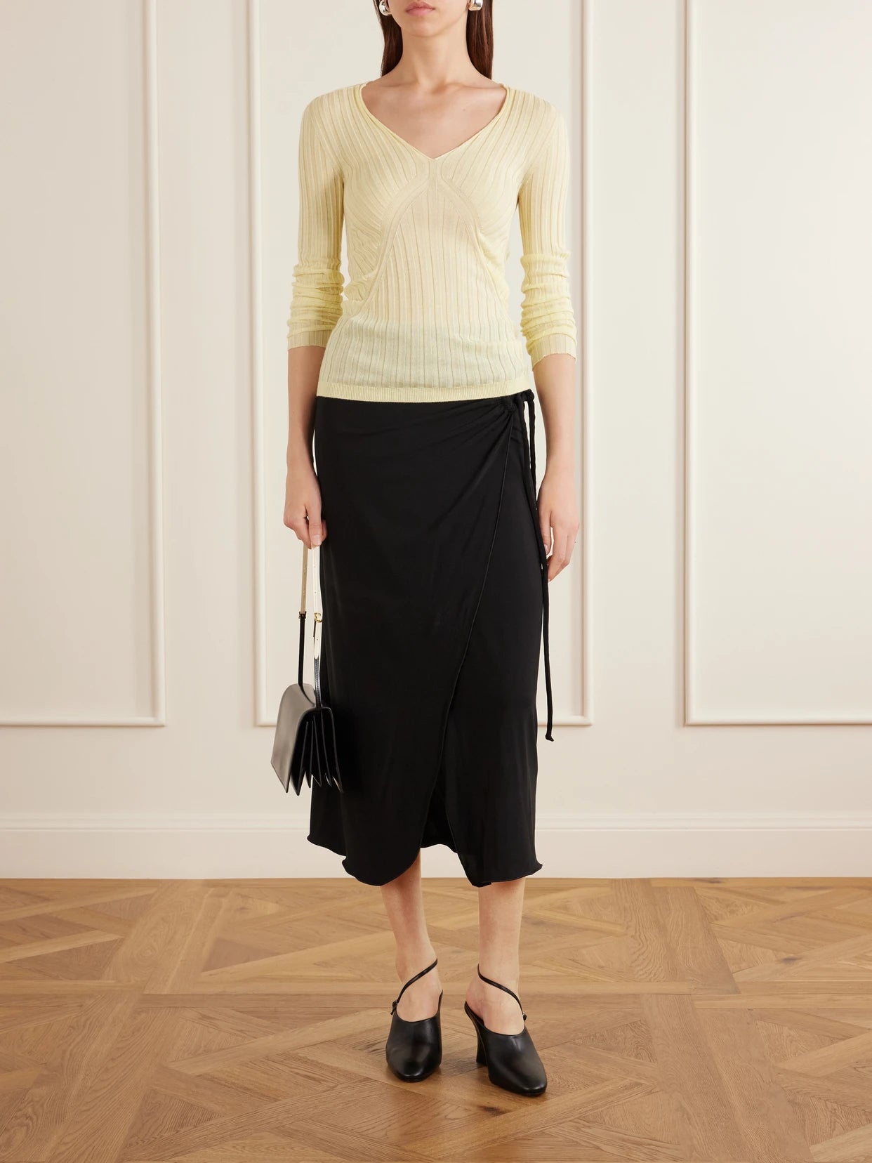 Image of a model wearing Outerwear. Product name - Ribbed Cashmere And Silk-blend Sweater in Pastel yellow colour by brand - Jil Sander