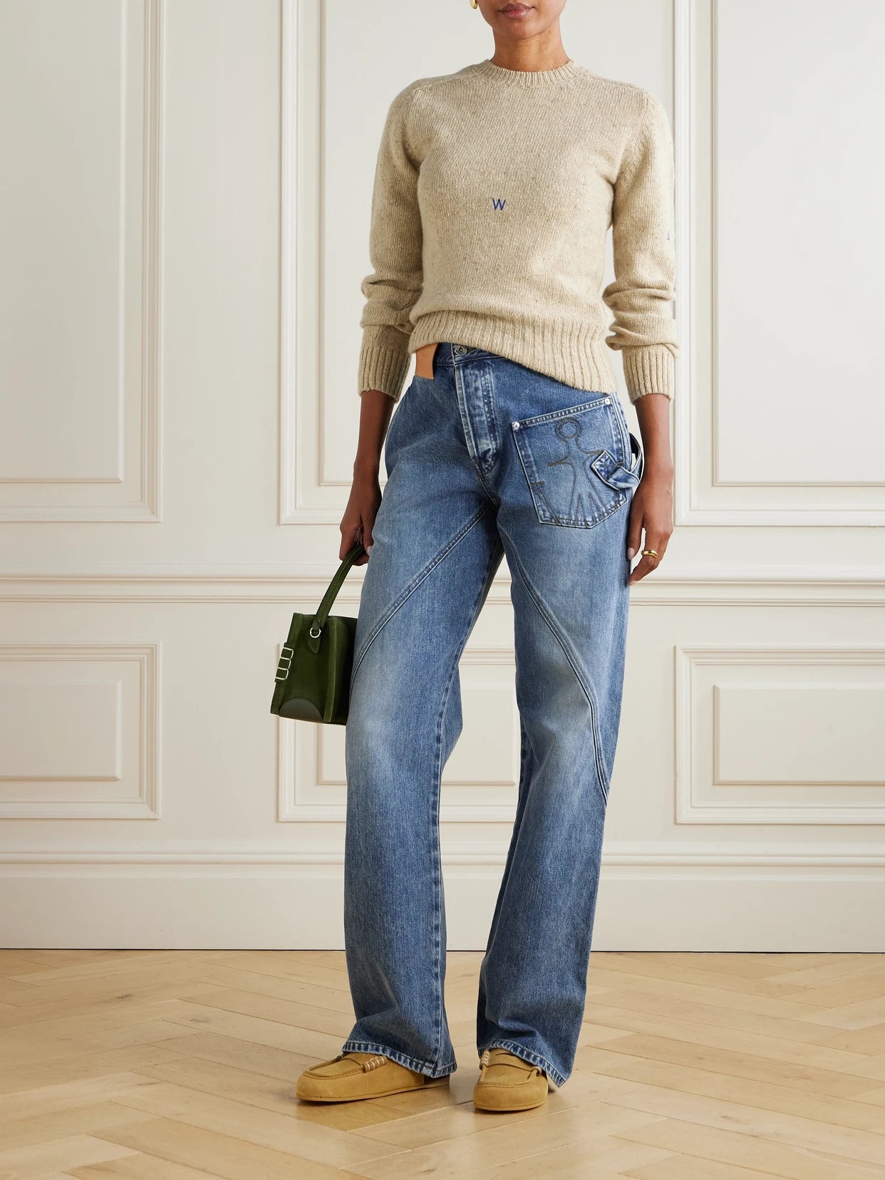 Image of a model wearing Outerwear. Product name - Embroidered Merino Wool And Mohair-blend Sweater in Beige colour by brand - JW Anderson