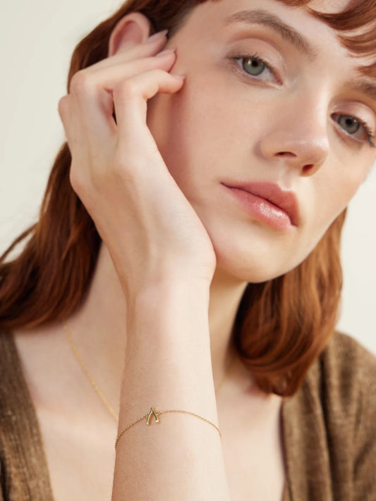 Image of Bracelets. Product name - Mini Wishbone 18-karat Gold Bracelet in Multi colour by brand - Jennifer Meyer