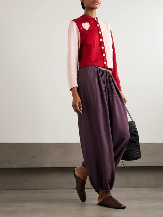 Image of a model wearing Outerwear. Product name - Wonderland Embroidered Knitted Cardigan in small colour by brand - BODE