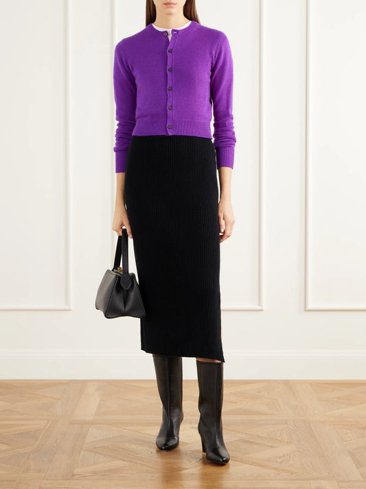 Image of a model wearing Outerwear. Product name - Cropped Rib-trimmed Cashmere Cardigan in Dark purple colour by brand - Auralee