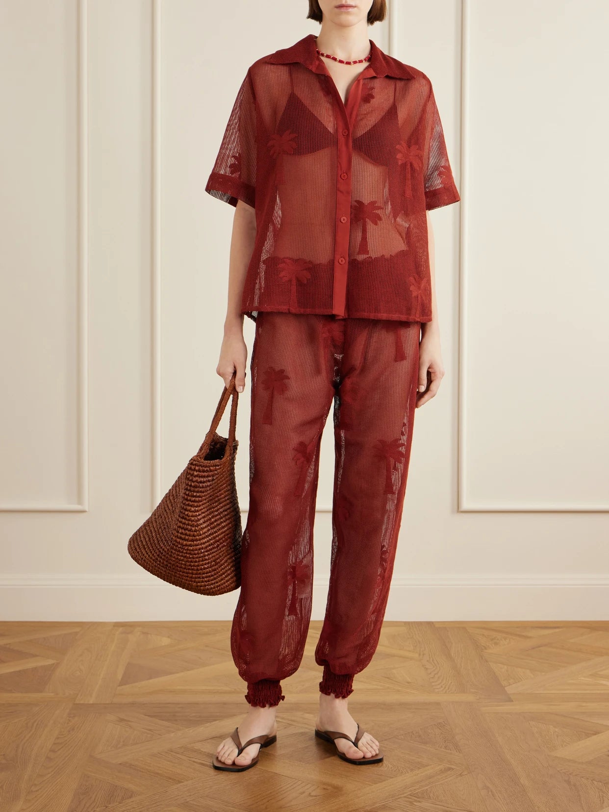 Image of a model wearing Tops. Product name - Marsala Salty Cotton-blend Mesh Shirt in Burgundy colour by brand - Johanna Ortiz