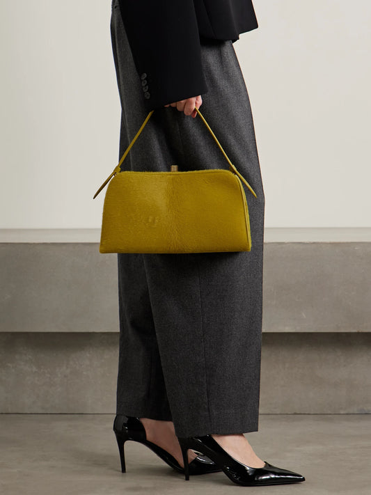Image of Bags. Product name - Cate Leather-trimmed Calf Hair Tote in Yellow colour by brand - KHAITE
