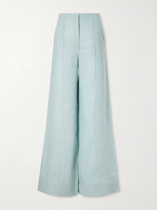 Image of a model wearing Pants. Product name - La Promesa Linen Wide-leg Pants in Light blue colour by brand - Andres Otalora