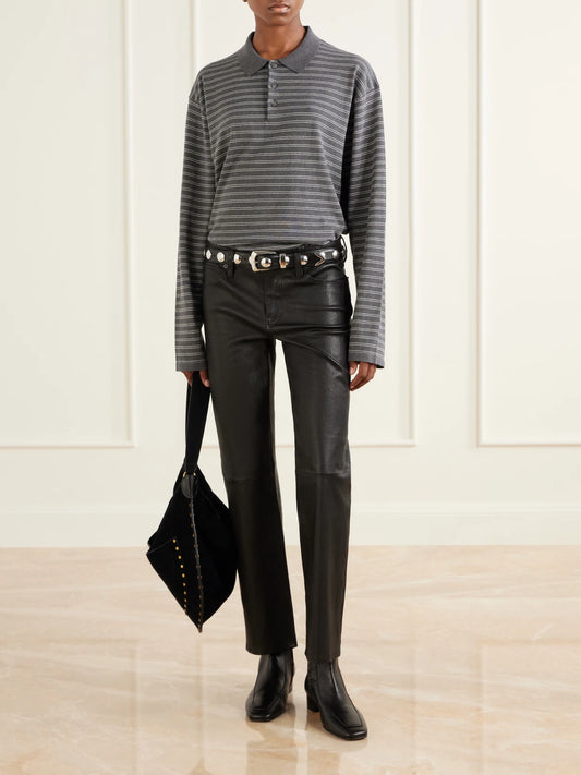 Image of a model wearing Pants. Product name - The Cigarette Low-rise Straight-leg Leather Pants in Black colour by brand - FRAME