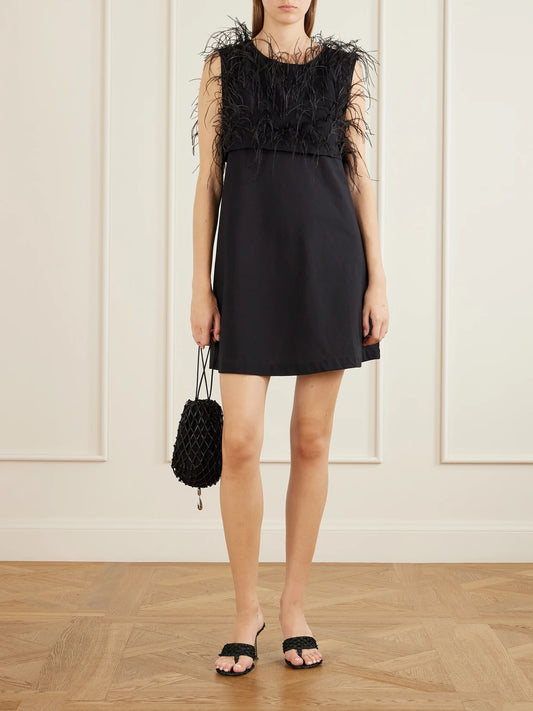 Image of a model wearing Tops. Product name - Cato Feather-trimmed Silk Tank in Black colour by brand - Sharon Wauchob