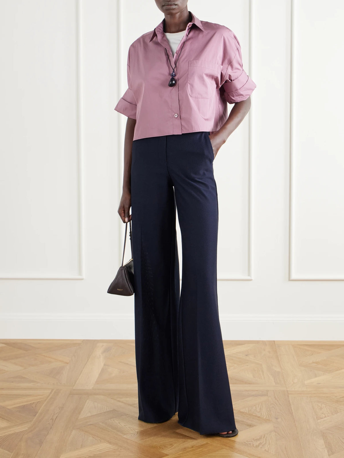 Image of a model wearing Tops. Product name - Next Ex Cropped Cotton-poplin Shirt in Pink colour by brand - TWP