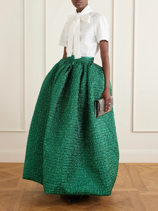 Image of a model wearing Skirts. Product name - Cloqué Maxi Skirt in Forest green colour by brand - Dima Ayad