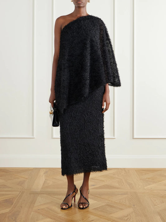 Image of a model wearing Skirts. Product name - Plush Midi Skirt in Black colour by brand - Abadia