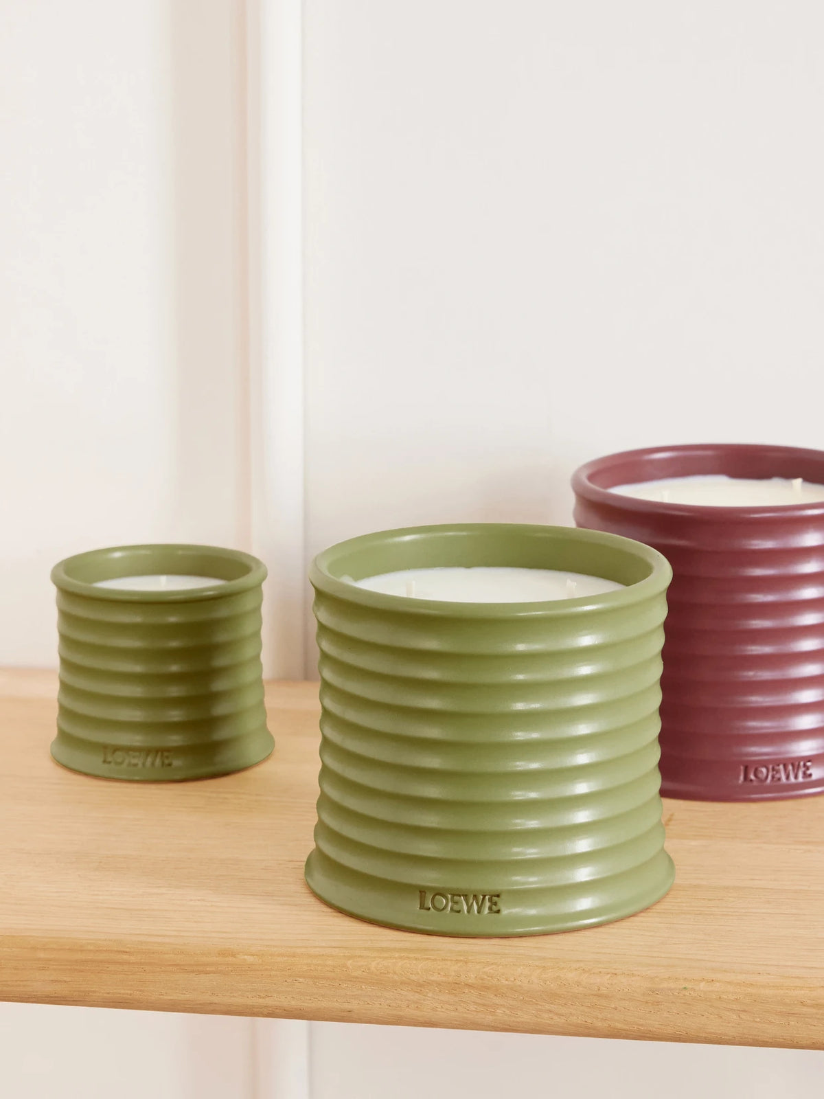 Image of Perfumes & Colognes. Product name - Pistachio Medium Candle, 610g in Green colour by brand - LOEWE PERFUMES