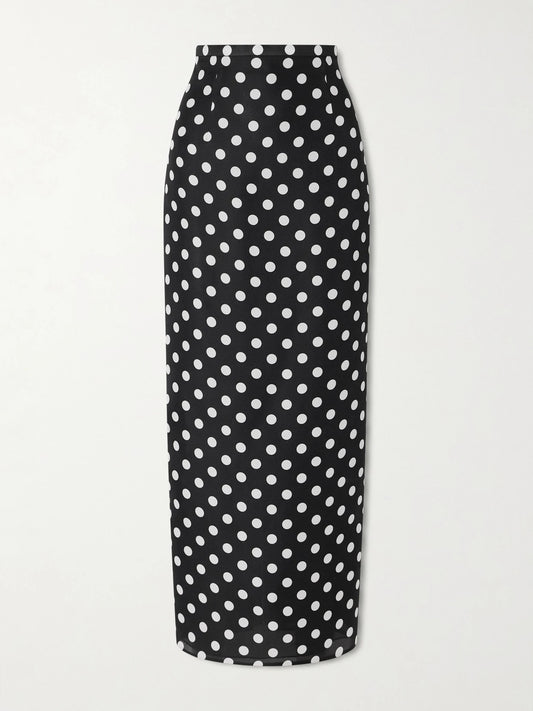 Image of a model wearing Skirts. Product name - Winton Polka-dot Silk Midi Skirt in Black colour by brand - KHAITE
