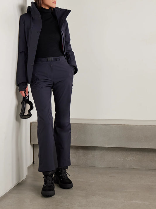 Image of a model wearing Pants. Product name - Belted Bootcut Ski Pants in Navy colour by brand - Moncler Grenoble
