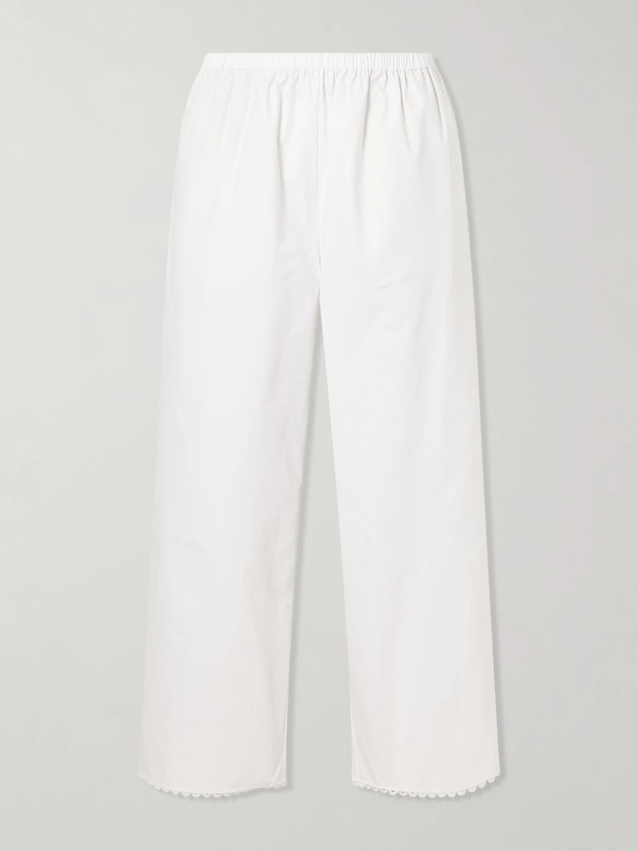 Image of a model wearing Pants. Product name - Embroidered Cotton-poplin Wide-leg Pants in White colour by brand - RÓHE