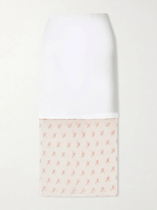 Image of a model wearing Skirts. Product name - Sybil Layered Frayed Satin-crepe And Floral-print Organza Midi Skirt in White colour by brand - KHAITE