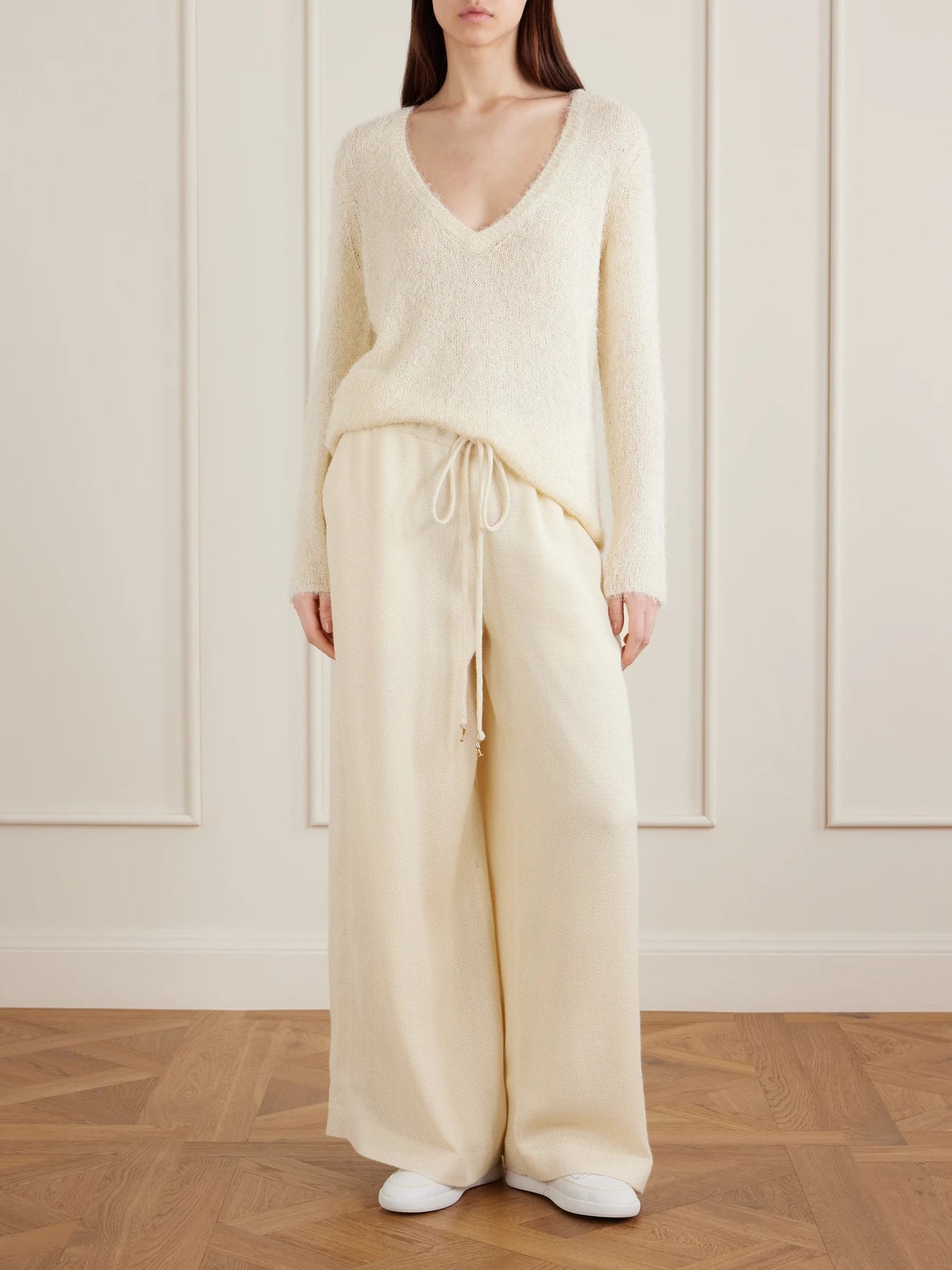 Image of a model wearing Outerwear. Product name - Neoma Silk And Cashmere-blend Sweater in Off-white colour by brand - Gabriela Hearst