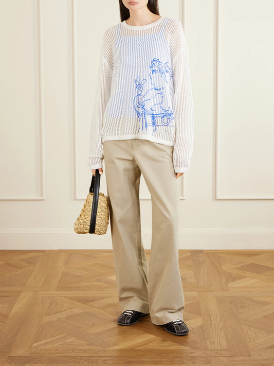 Image of a model wearing Pants. Product name - Cotton Wide-leg Pants in Beige colour by brand - Still Here
