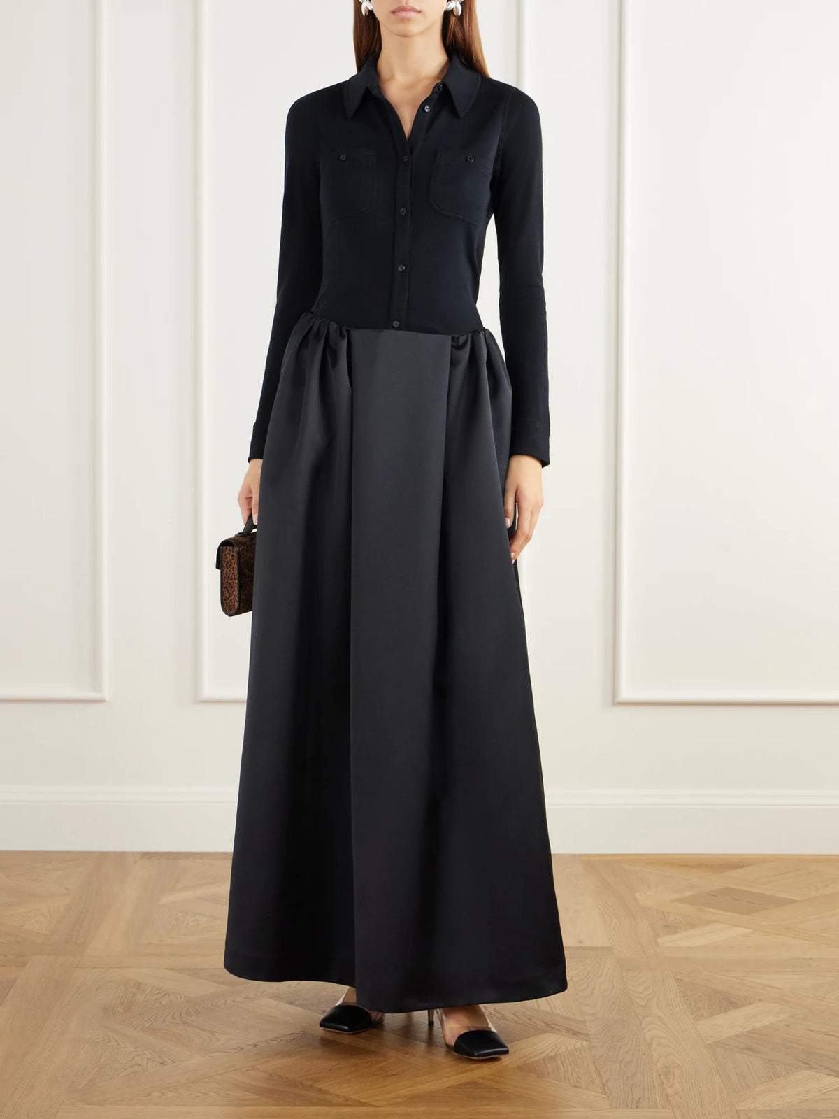Image of a model wearing Skirts. Product name - Callum Taffeta Maxi Skirt in Black colour by brand - BERNADETTE