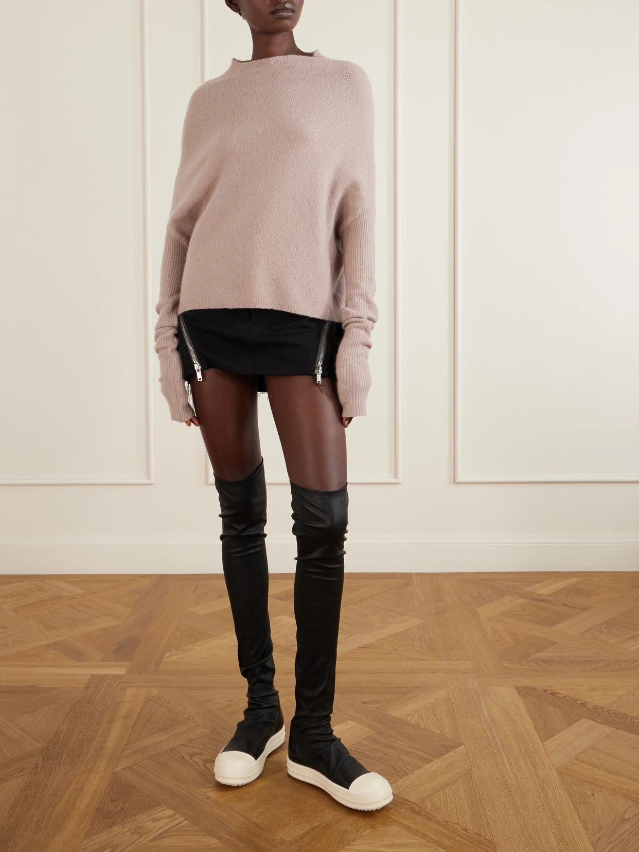 Image of a model wearing Outerwear. Product name - Crater Cashmere-blend Turtleneck Sweater in Blush colour by brand - Rick Owens