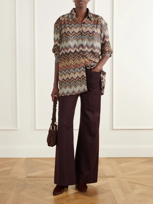 Image of a model wearing Tops. Product name - Sequin-embellished Metallic Crochet-knit Blouse in Multi colour by brand - Missoni