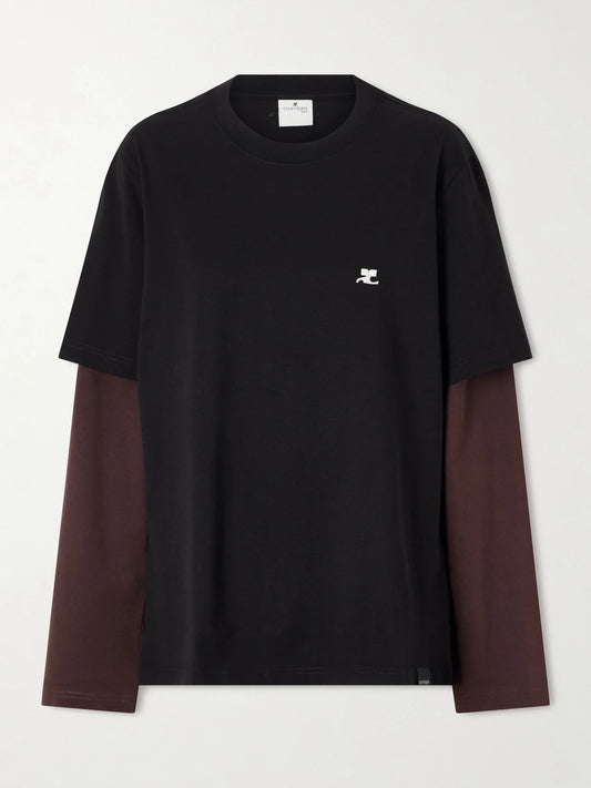 Image of a model wearing Tops. Product name - Logo-embroidered Cotton-jersey T-shirt in Black colour by brand - COURREGES