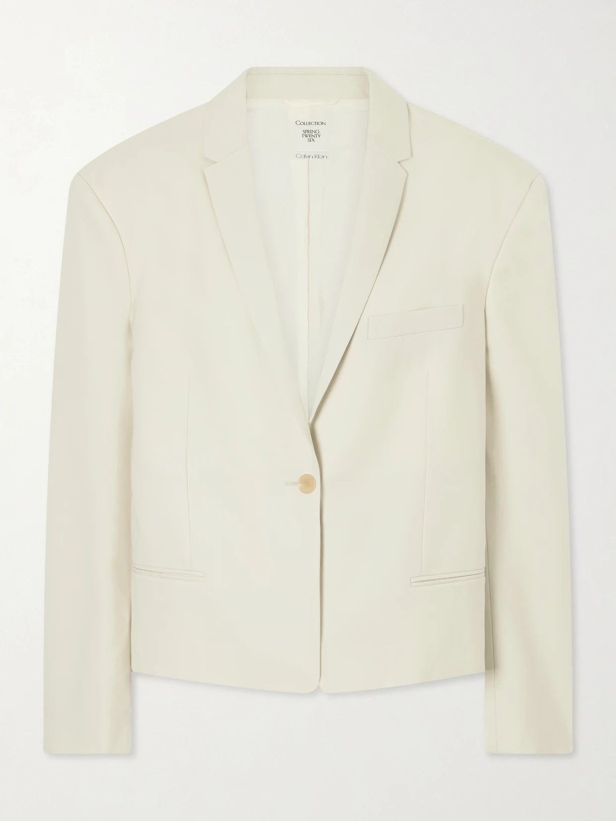 Image of a model wearing Outerwear. Product name - Cordelia Wool-twill Blazer in Beige colour by brand - Calvin Klein Collection