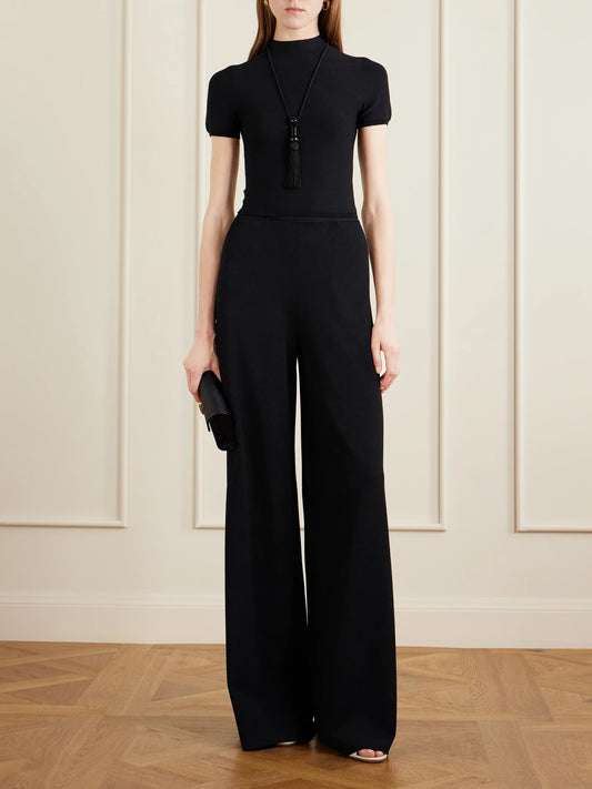 Image of a model wearing Pants. Product name - Stretch-jersey Mid-rise Wide-leg Pants in Black colour by brand - Ralph Lauren Collection
