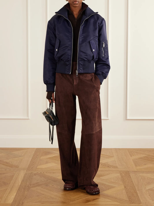 Image of a model wearing Outerwear. Product name - Sade Ribbed Wool And Silk-blend Half-zip Sweater in Brown colour by brand - The Frankie Shop