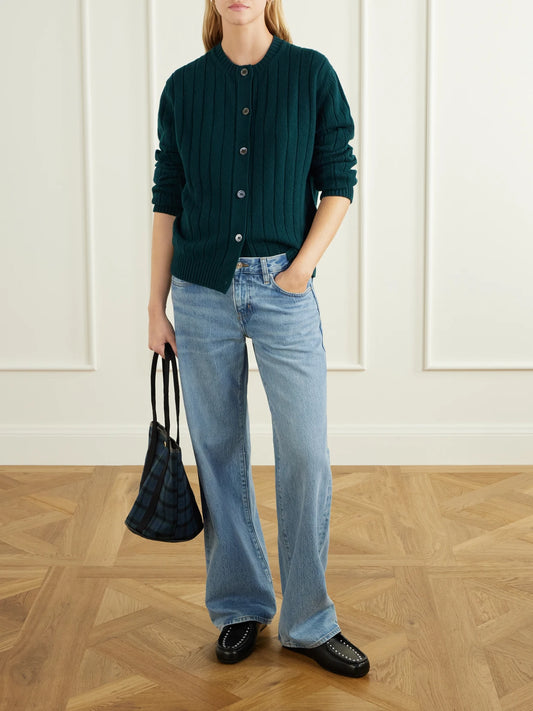 Image of a model wearing Outerwear. Product name - Rooney Ribbed Wool Cardigan in Emerald colour by brand - &Daughter