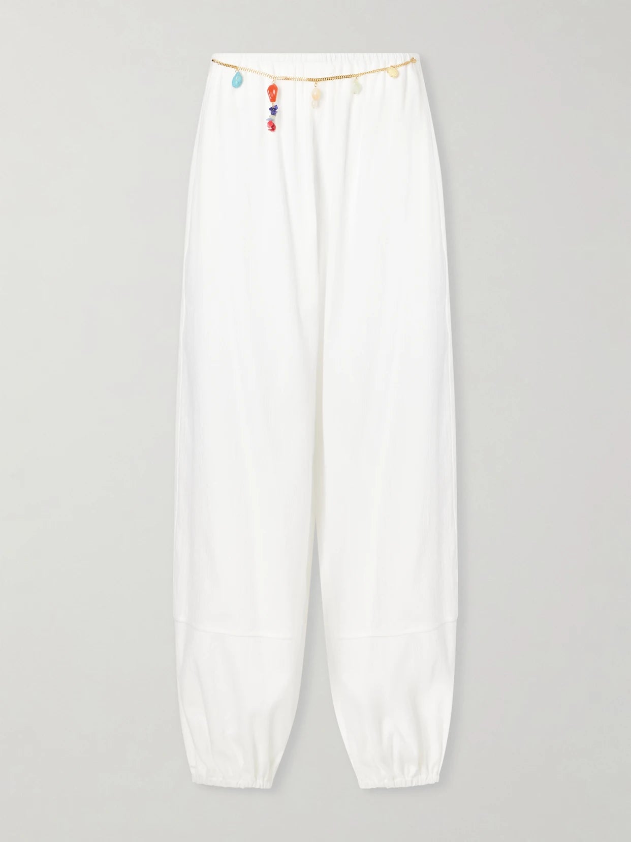 Image of a model wearing Pants. Product name - Embellished Cotton-crepe Balloon Pants in White colour by brand - Stella McCartney