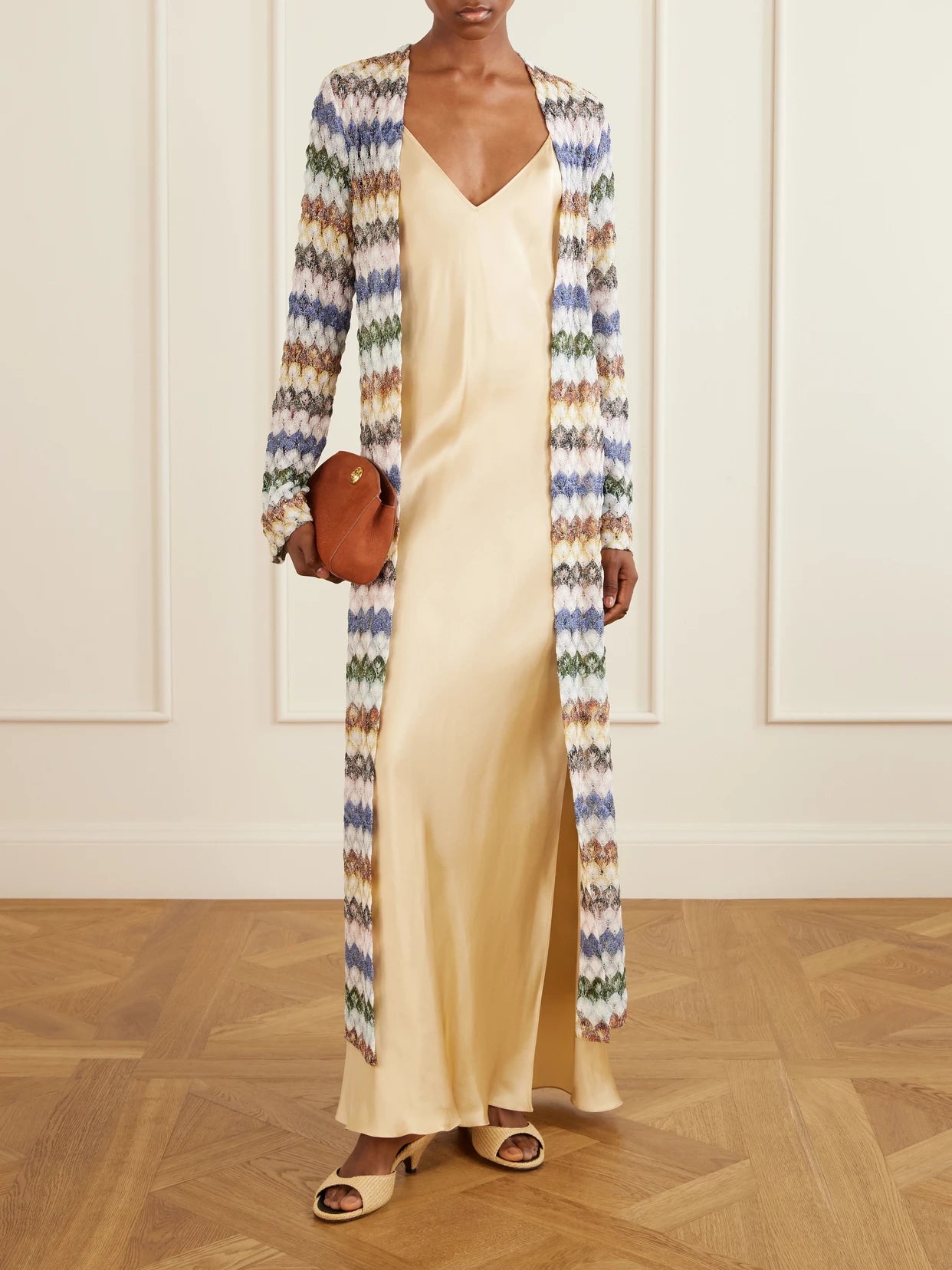 Image of a model wearing Outerwear. Product name - Striped Crochet-knit Cardigan in Multi colour by brand - Missoni