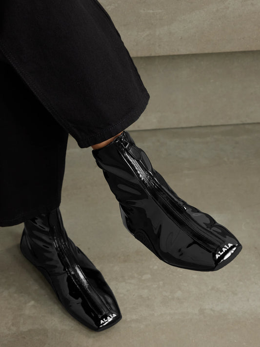 Alaïa Glossed Ankle Boots