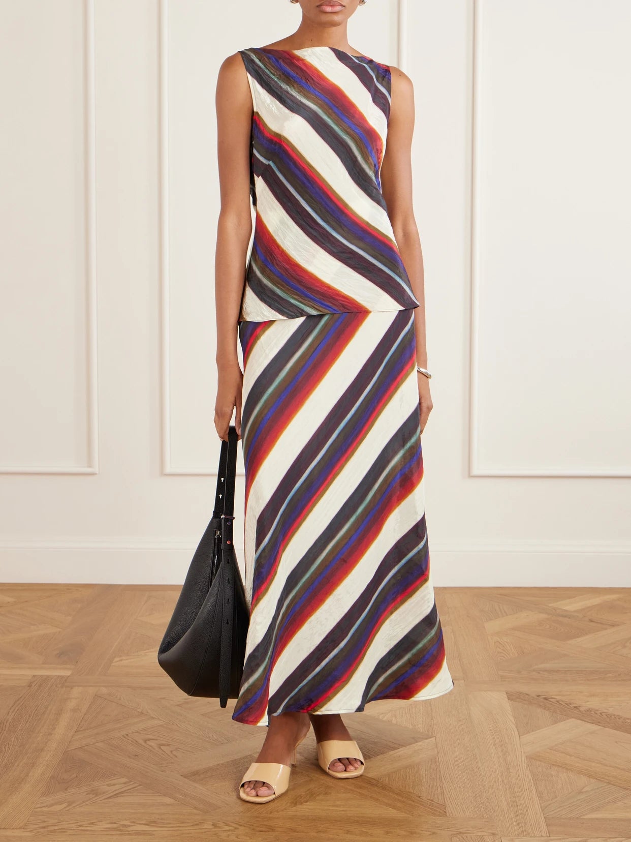 Image of a model wearing Tops. Product name - Morris Striped Crinkled-satin Top in Multi colour by brand - Christopher John Rogers