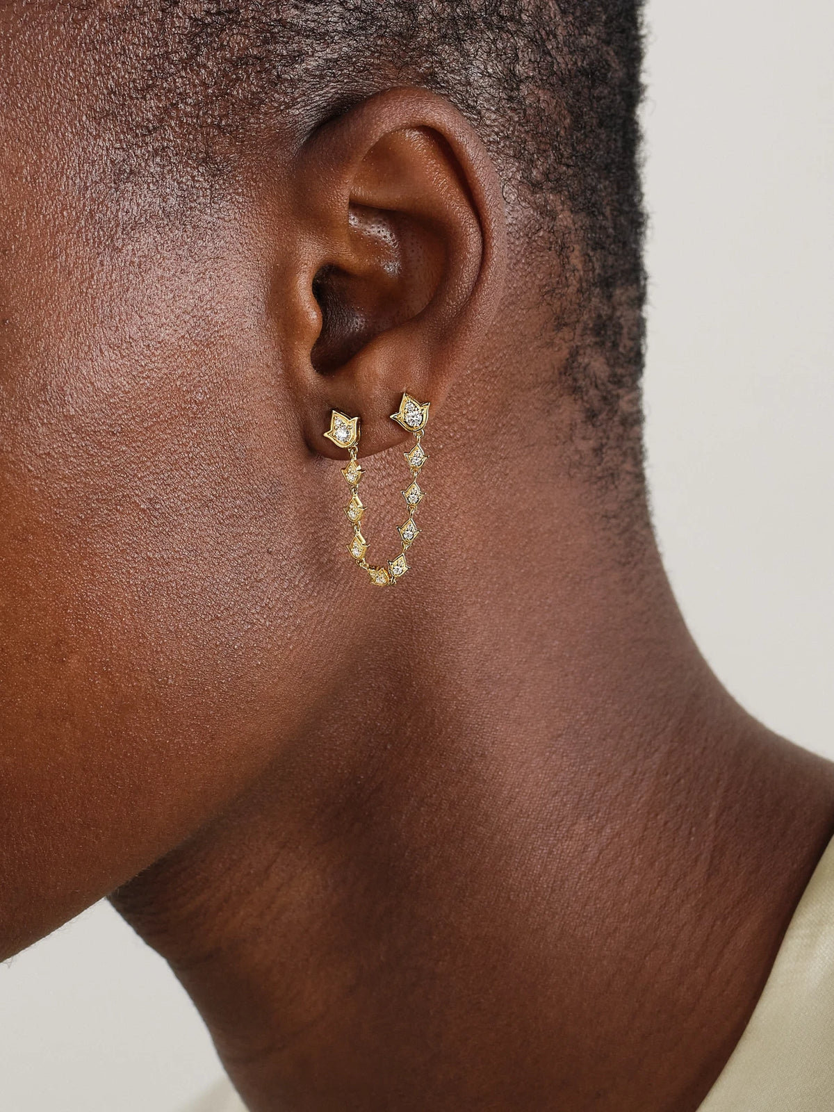 Image of Earrings. Product name - Tulip 18-karat Gold Diamond Single Earring in Multi colour by brand - Anita Ko