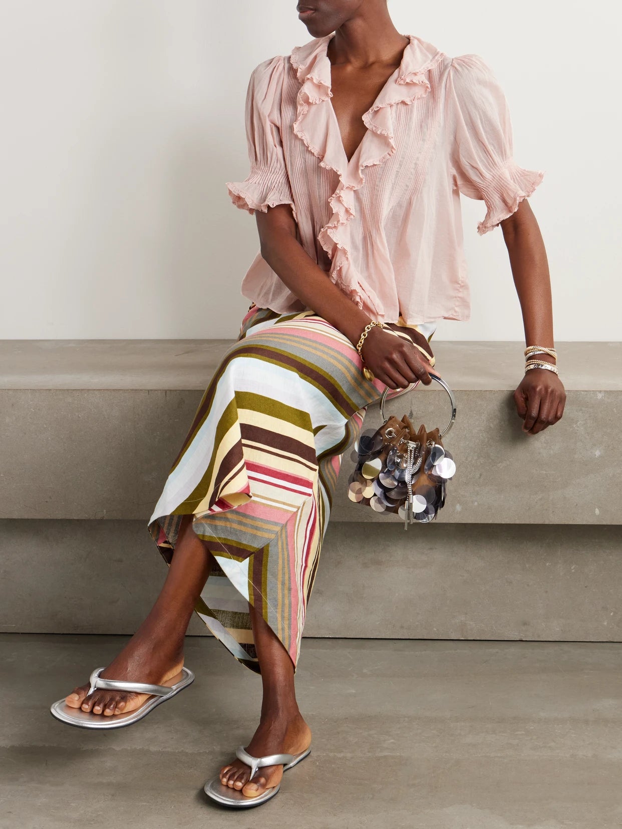 Image of a model wearing Tops. Product name - Henri Lace-trimmed Ruffled Pintucked Organic Cotton-voile Blouse in Blush colour by brand - DÔEN