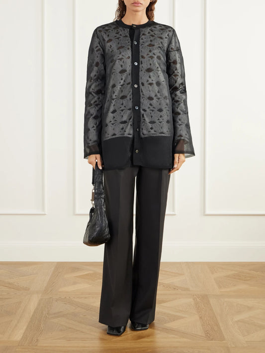 Image of a model wearing Outerwear. Product name - Layered Mesh And Crochet-knit Cardigan in Black colour by brand - Comme des Garçons