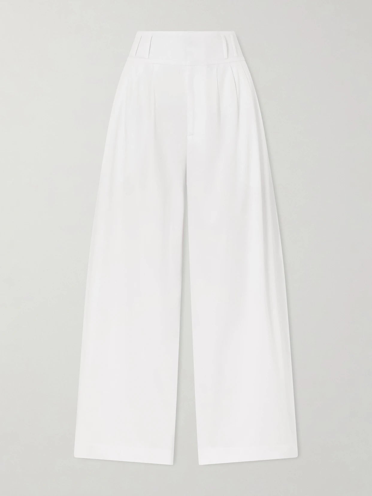 Image of a model wearing Pants. Product name - Wilson Pleated Cotton Wide-leg Pants in White colour by brand - Altuzarra