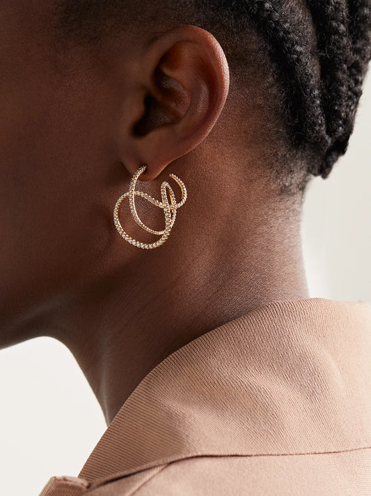 Image of Earrings. Product name - Twisted Love 18-karat Gold Diamond Earrings in Multi colour by brand - OLE LYNGGAARD COPENHAGEN