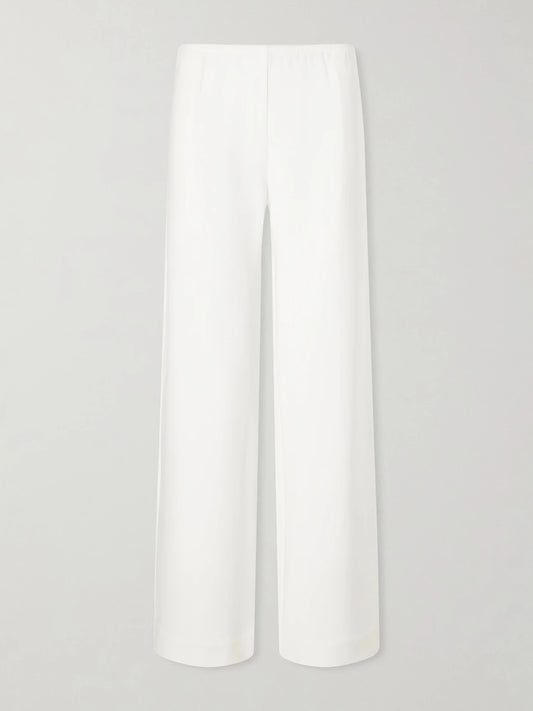 Image of a model wearing Pants. Product name - Arielle Crepe Wide-leg Pants in White colour by brand - LESET