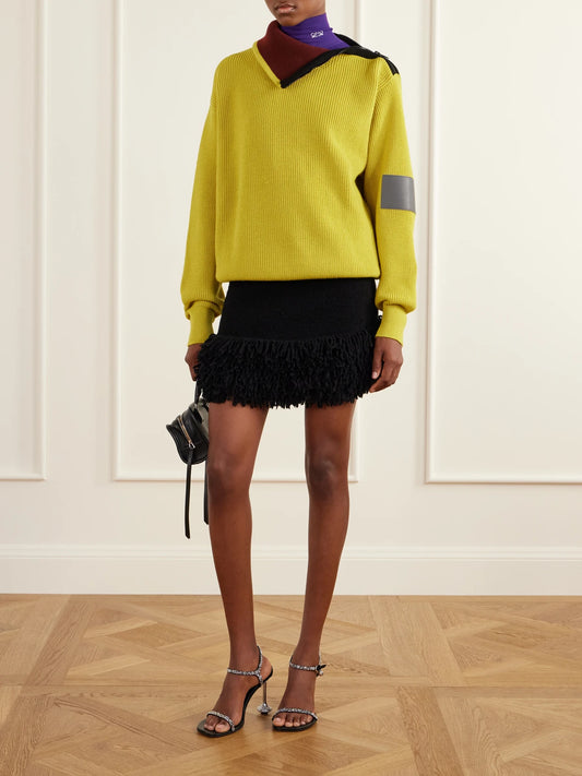 Image of a model wearing Outerwear. Product name - Zip-detailed Leather-trimmed Ribbed Wool-blend Turtleneck Sweater in Lime green colour by brand - LOEWE