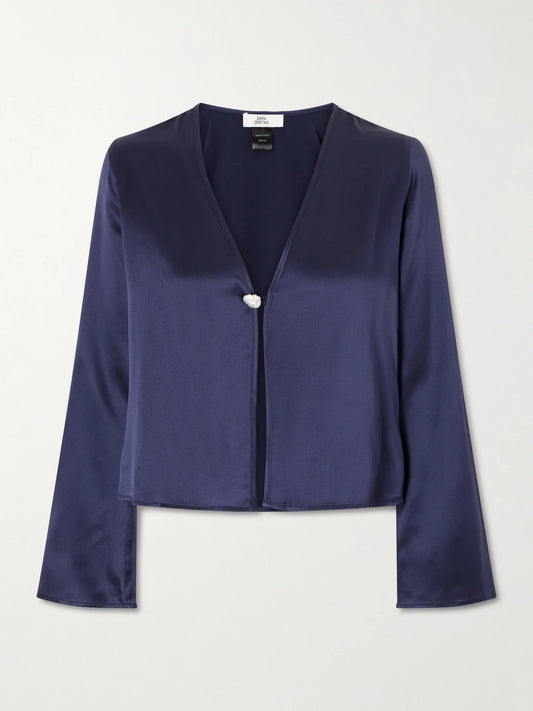 Image of a model wearing Tops. Product name - Nerea Silk Blouse in Navy colour by brand - Sara Cristina
