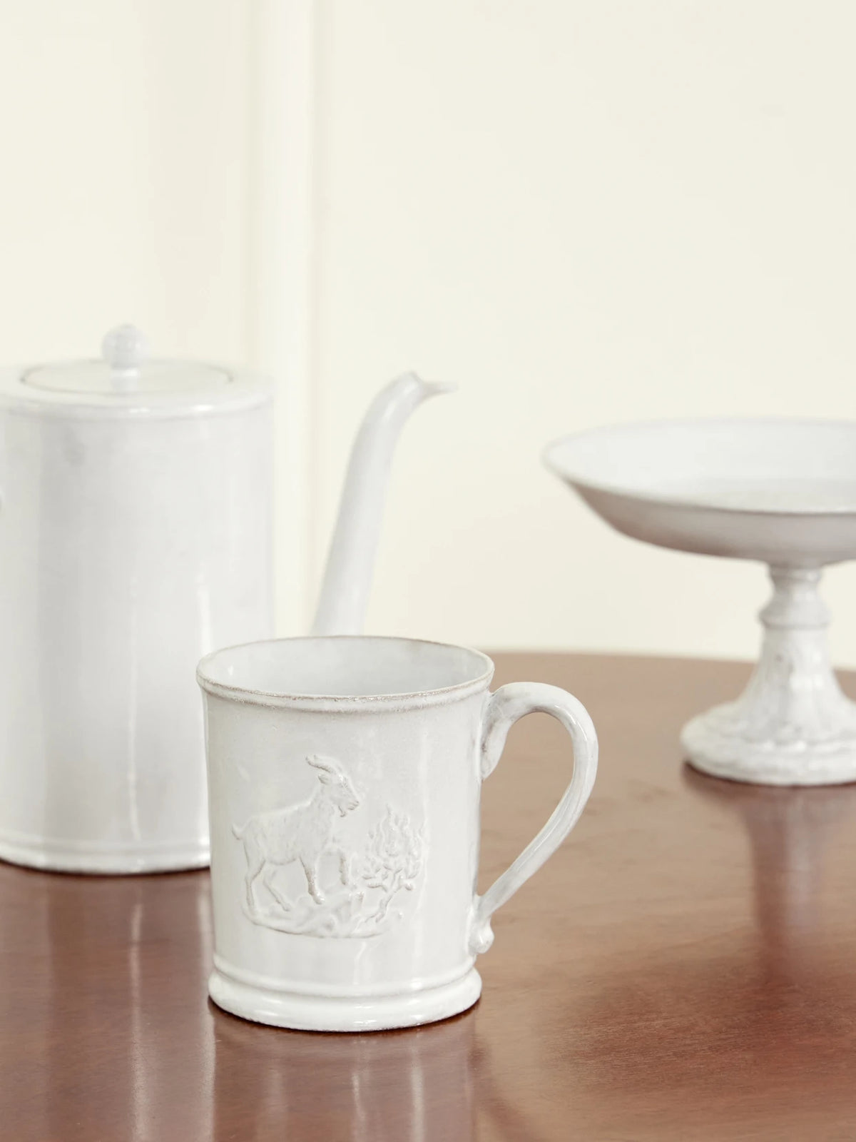 Image of Tableware. Product name - Year Of The Sheep Goat Ceramic Cup in White colour by brand - Astier De Villatte