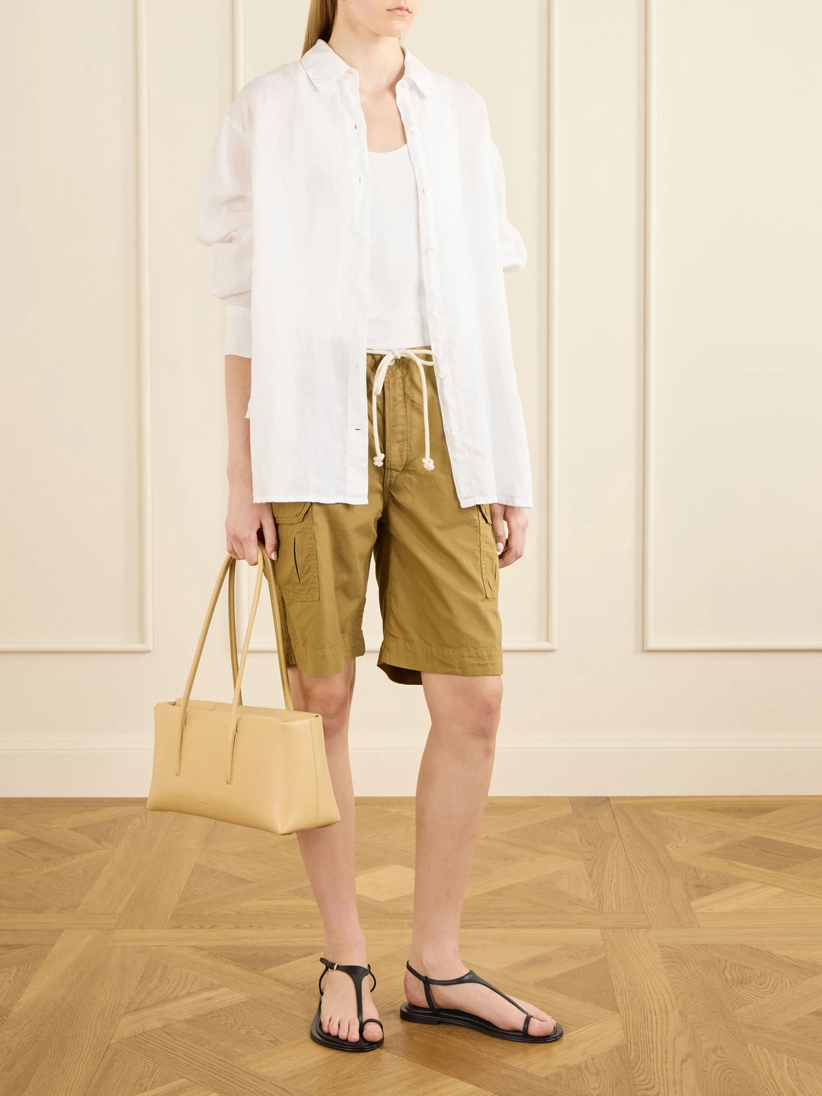 Image of a model wearing Shorts. Product name - The Rope Tie Jersey Cargo Shorts in Camel colour by brand - Jamie Haller