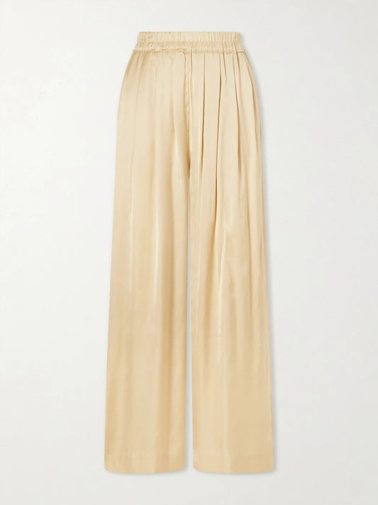 Image of a model wearing Pants. Product name - Nolia Satin Wide-leg Pants in Beige colour by brand - ISABEL MARANT