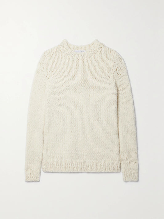 Image of a model wearing Outerwear. Product name - Lawrence Cashmere Sweater in Ivory colour by brand - Gabriela Hearst