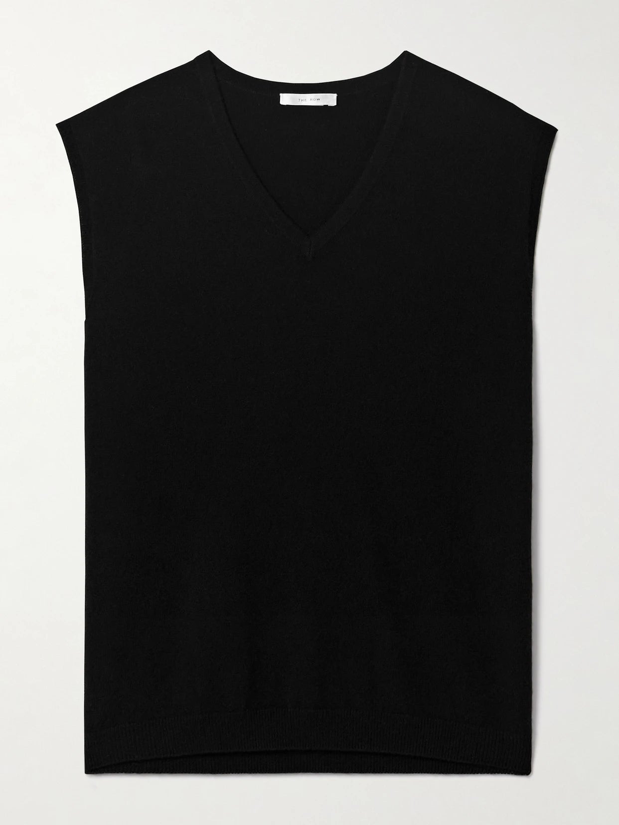 Image of a model wearing Outerwear. Product name - Kossy Cashmere Vest in Black colour by brand - The Row