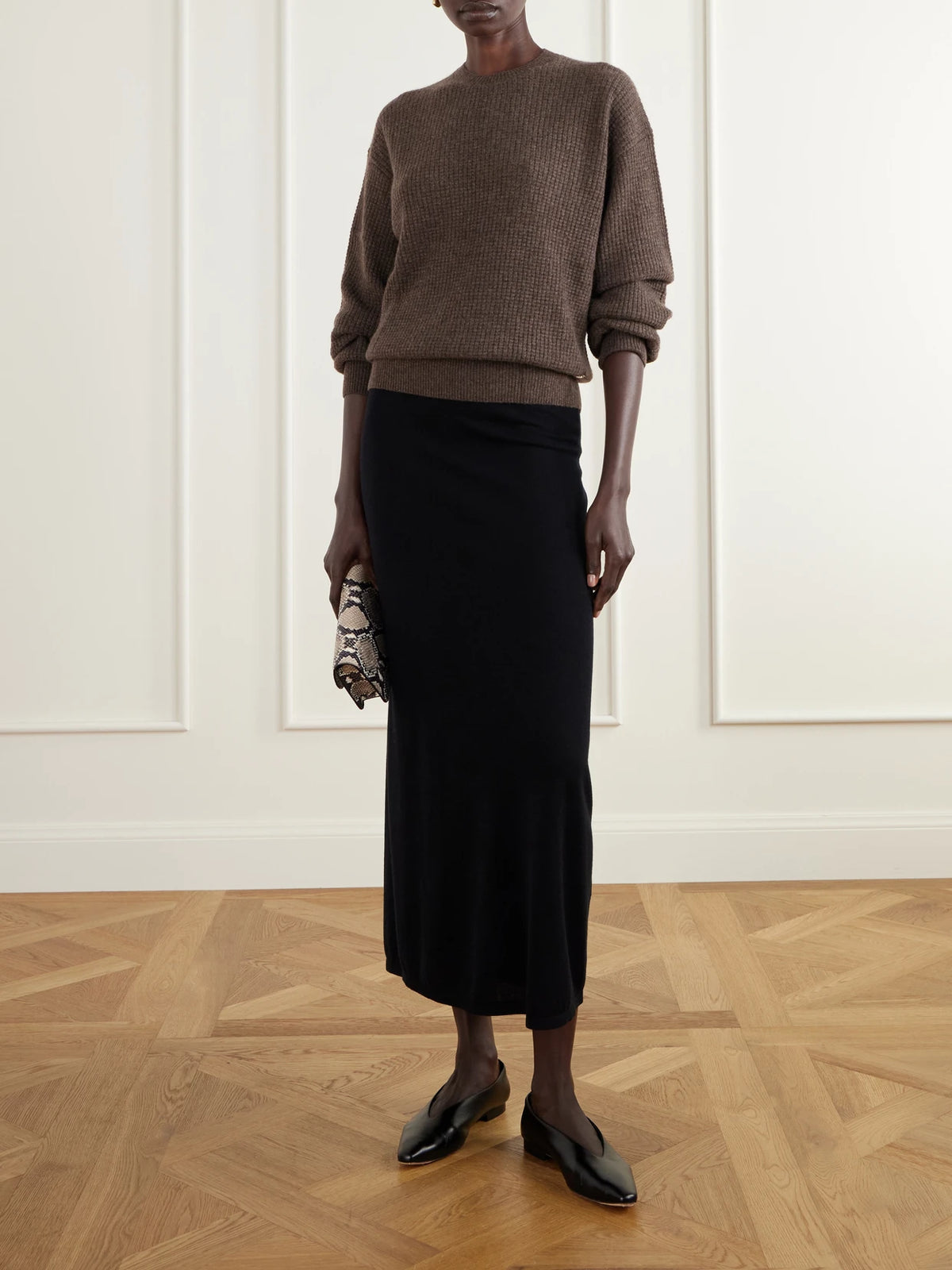 Image of a model wearing Outerwear. Product name - Brock Waffle-knit Cashmere Sweater in Brown, Cream colour by brand - ÉTERNE
