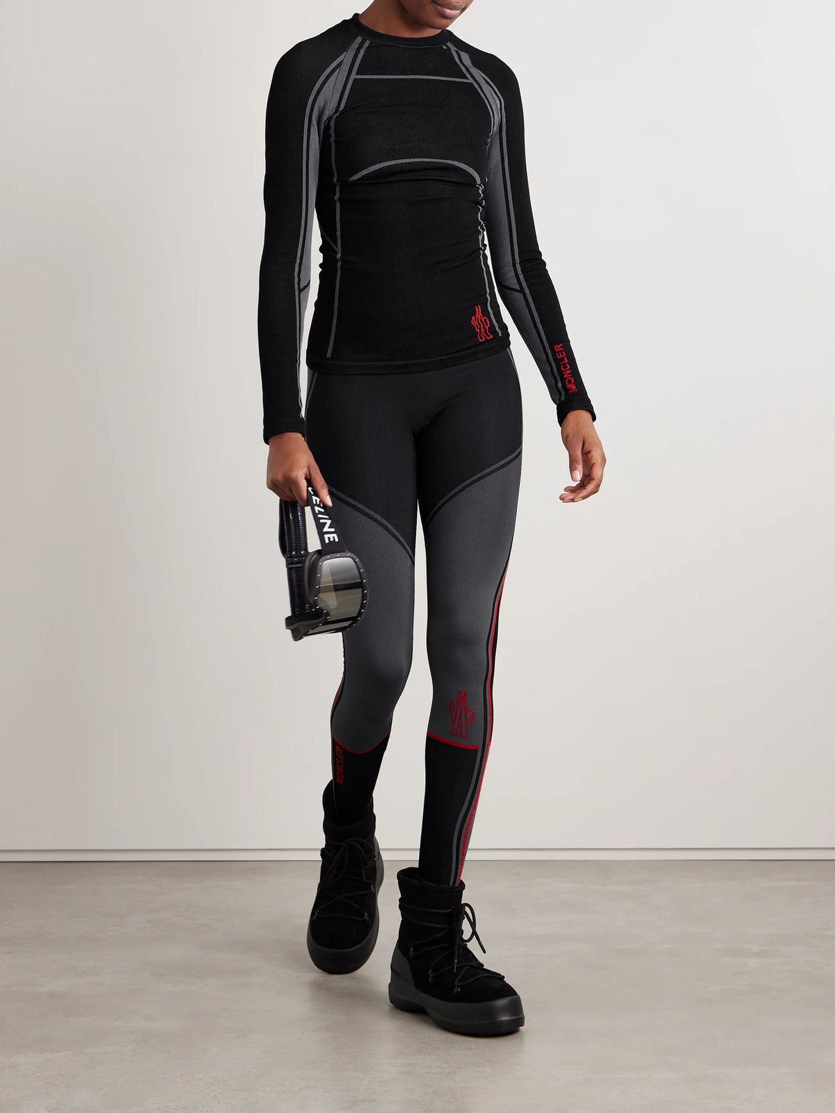 Image of a model wearing Tops. Product name - Stretch-knit Base Layer in Black colour by brand - Moncler Grenoble