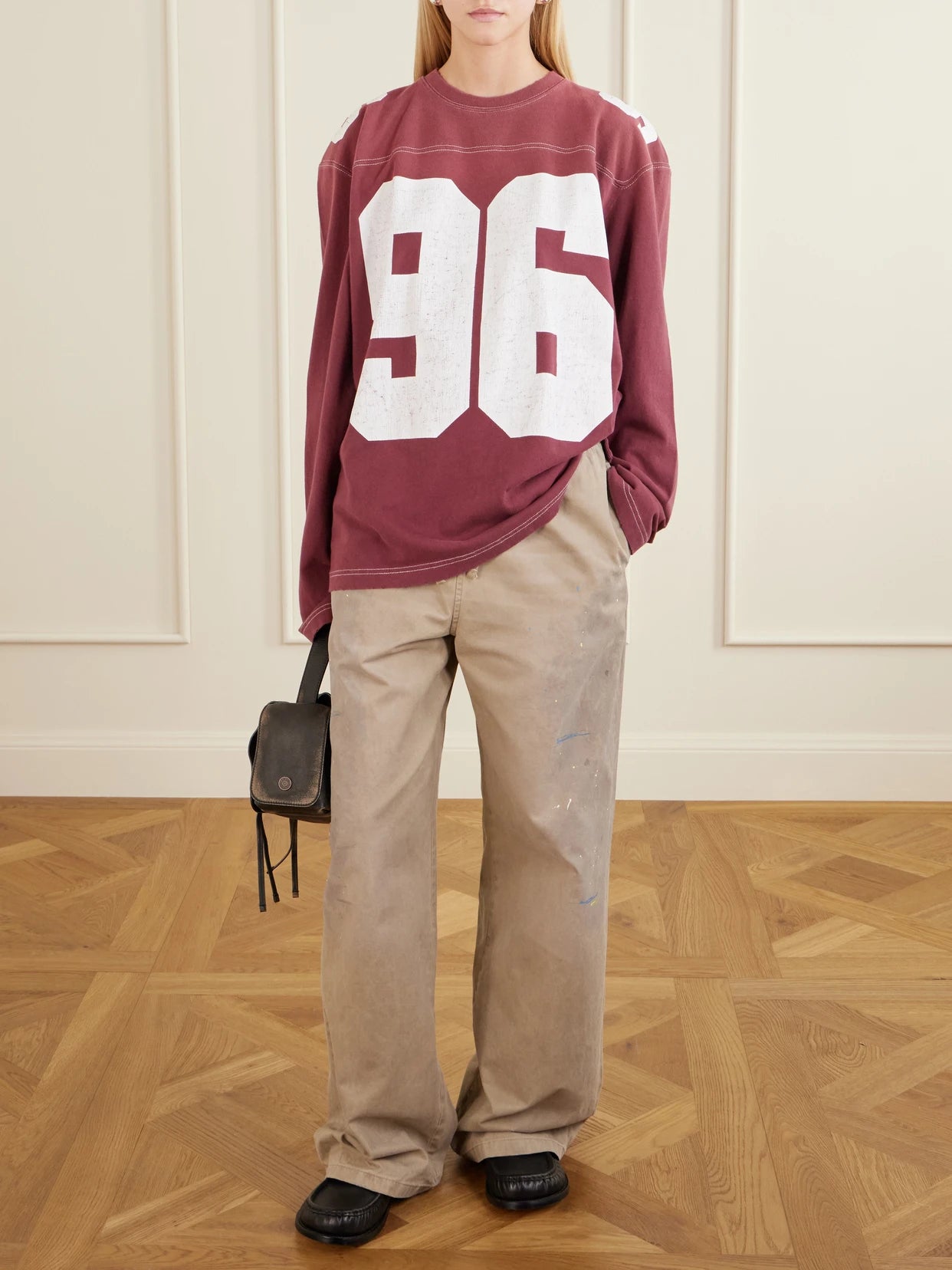 Image of a model wearing Tops. Product name - Exfold Printed Cotton-jersey Sweater in Red colour by brand - Acne Studios