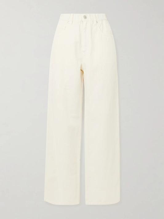 Image of a model wearing Pants. Product name - Bead-embellished Cotton And Linen-blend Wide-leg Pants in White colour by brand - Brunello Cucinelli